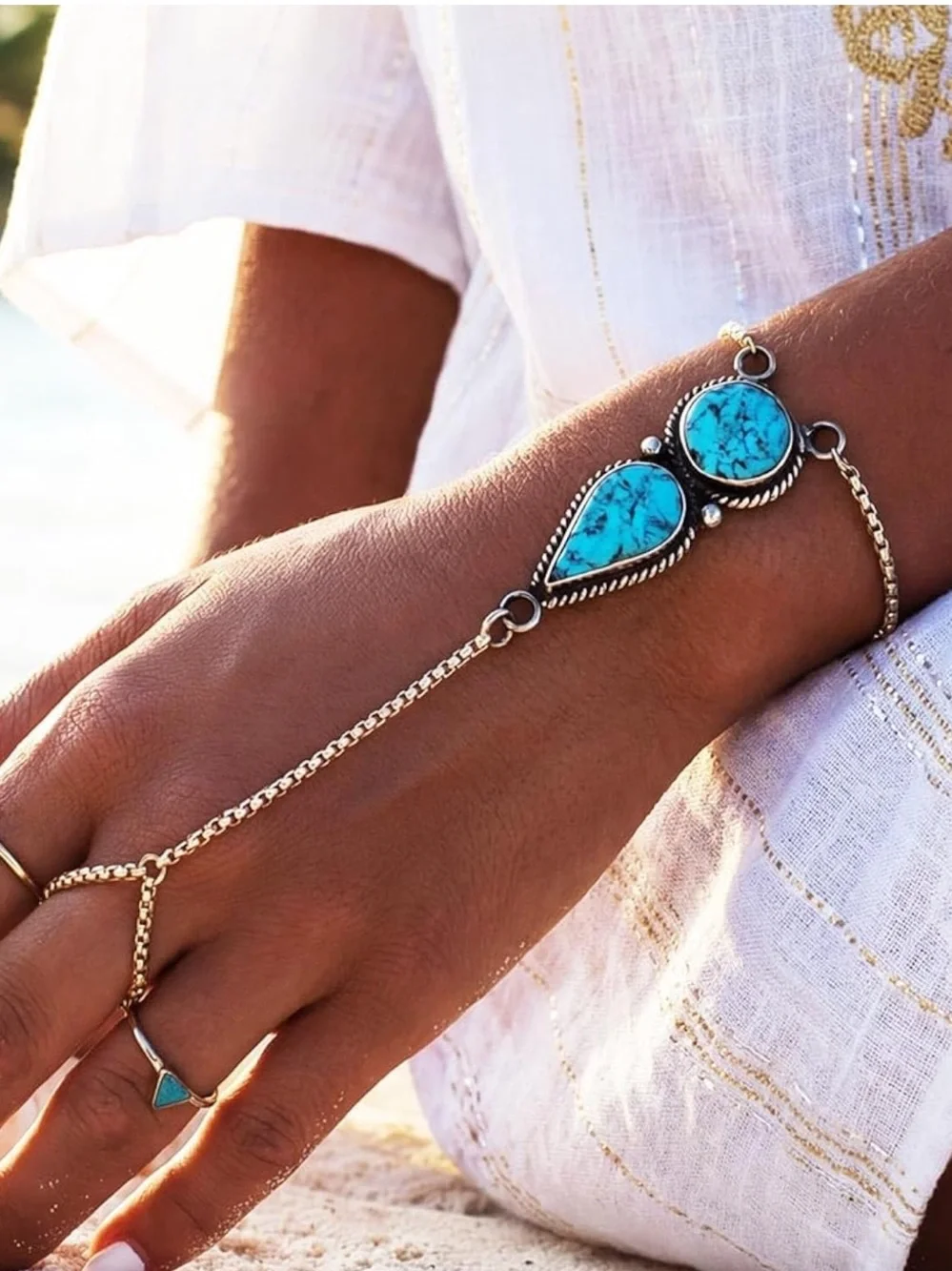 Anthropologie Turquoise and Silver color Hand Chain & Ring Set